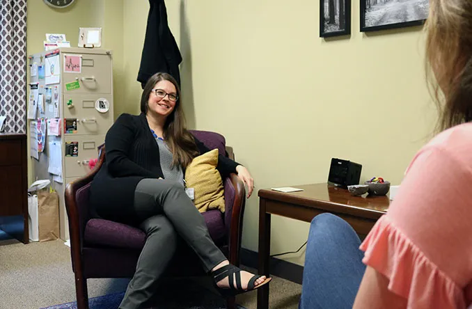 CAPS counselor with student at UHC